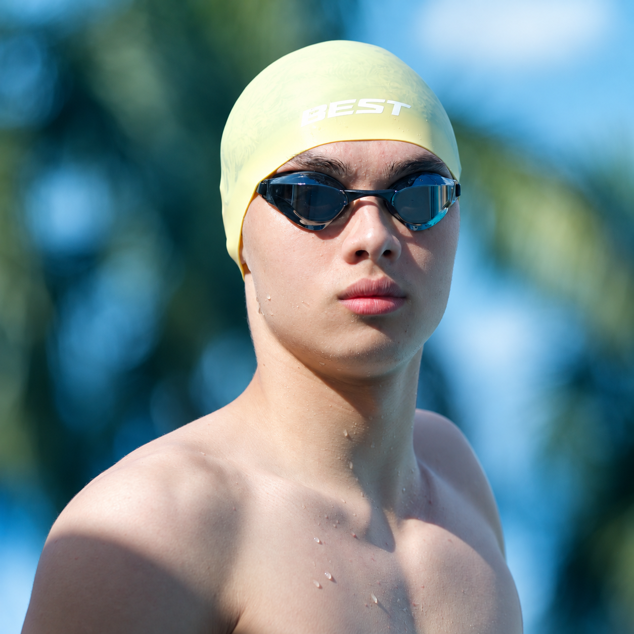 Swimmer wearing the Honeycomb BEST Pastel Performance Dome Cap