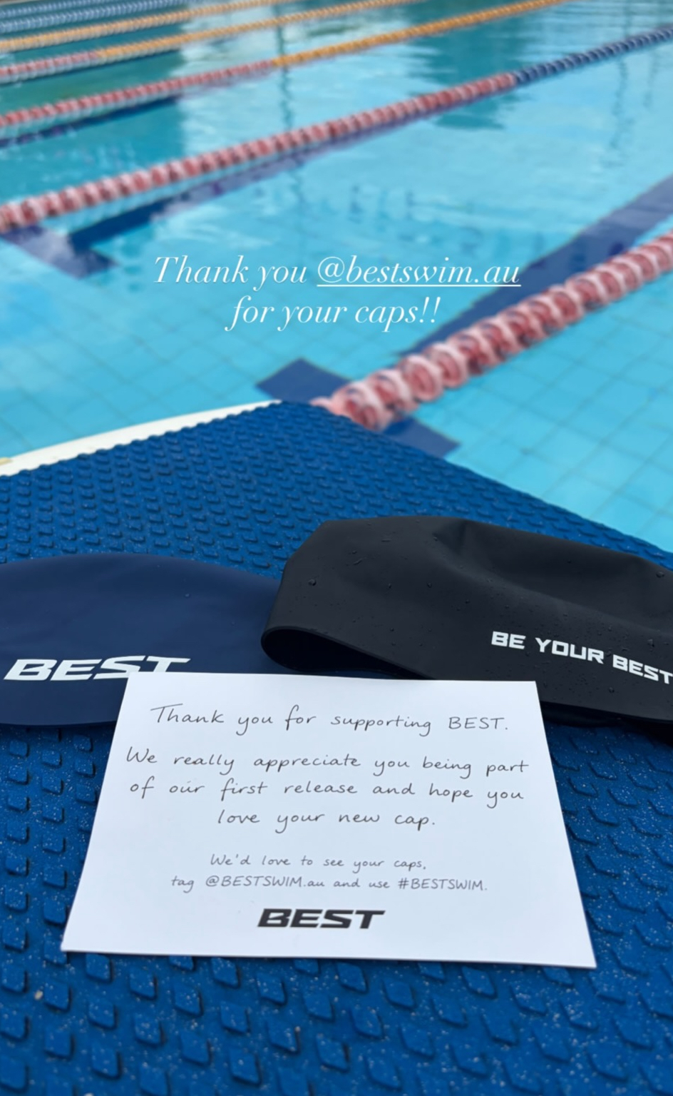 Navy BEST performance dome cap resting on the pool deck